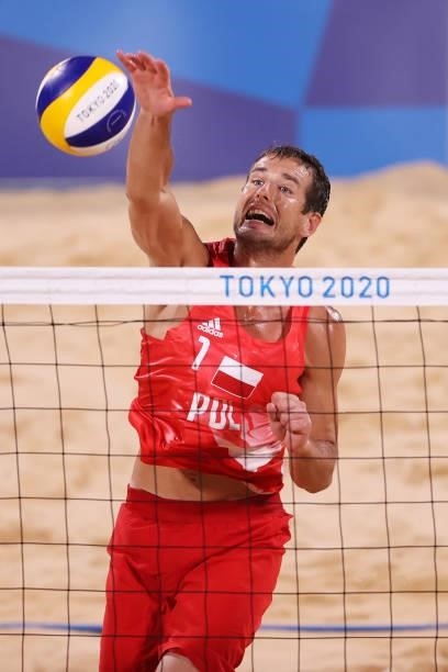 Piotr Kantor of Team Poland competes against Team Germany during the Men's Preliminary - Pool F beach volleyball on day four of the Tokyo 2020...