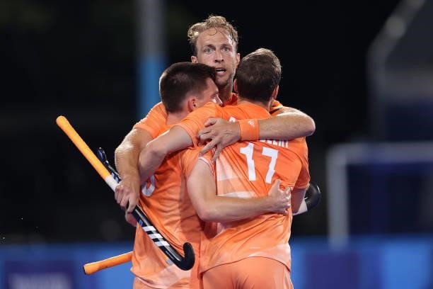 Thierry Brinkman of Team Netherlands celebrates with teammates Roel Bovendeert and Billy Bakker after scoring their team's second goal during the...