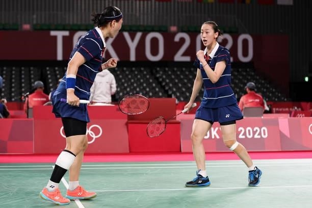 Lee Sohee and Shin Seungchan of Team South Korea react as they compete against Du Yue and Li Yin Hui of Team China during a Women's Doubles Group B...