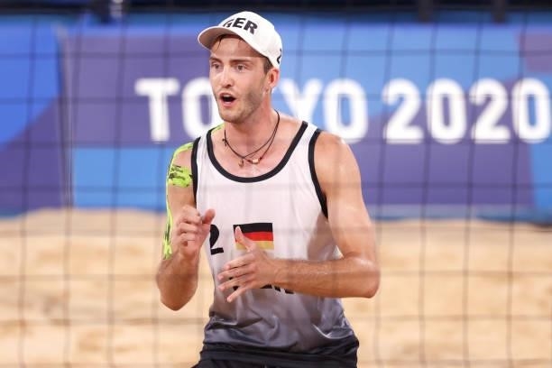 Clemens Wickler of Team Germany reacts against Team Poland during the Men's Preliminary - Pool F beach volleyball on day four of the Tokyo 2020...