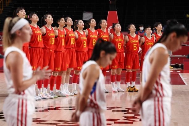 Team China stands for the National Anthem before their game against Puerto Rico in Women's Preliminary Round Group C action on day four of the Tokyo...