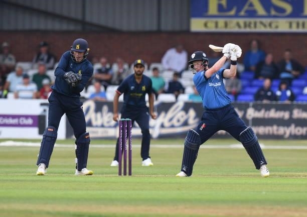 Harry Came of Derbyshire is caught out by wicketkeeper Michael Burgess of Warwickshire during the Royal London Cup match between Derbyshire and...
