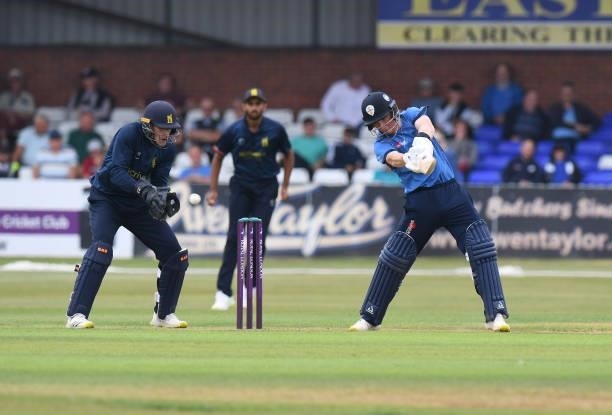Harry Came of Derbyshire is caught out by wicketkeeper Michael Burgess of Warwickshire during the Royal London Cup match between Derbyshire and...