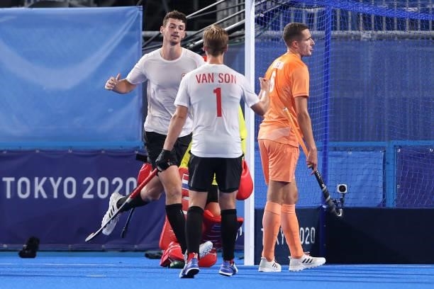 James Brodie Burns Wallace of Team Canada celebrates with teammate Floris Frederik van Son after scoring their team's first goal during the Men's...