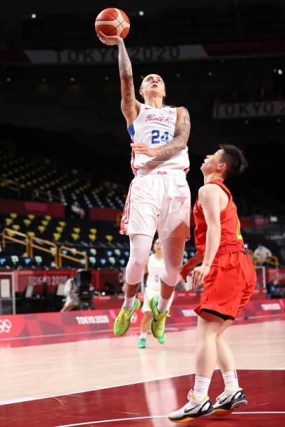 Jazmon Gwathmey of Team Puerto Rico takes a shot over Yuan Li of Team China during the first half of a Women's Preliminary Round Group C game on day...