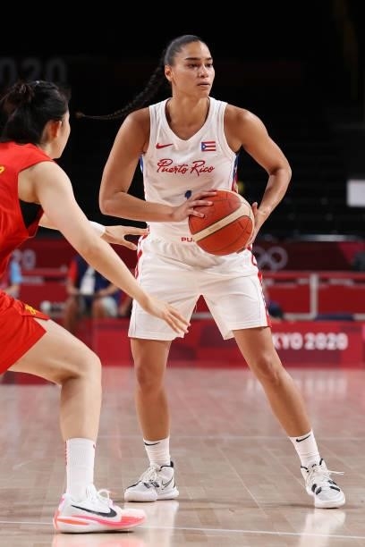 Tayra Melendez of Team Puerto Rico looks to set up the offense against China during the first half of a Women's Preliminary Round Group C game on day...