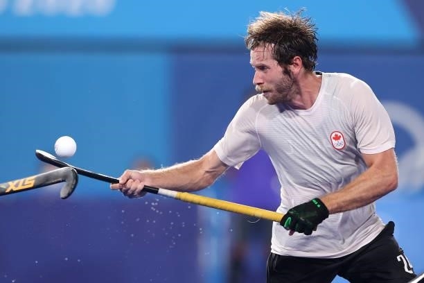James Alexander Paget Kirkpatrick of Team Canada controls the ball during the Men's Preliminary Pool B match between Netherlands and Canada on day...