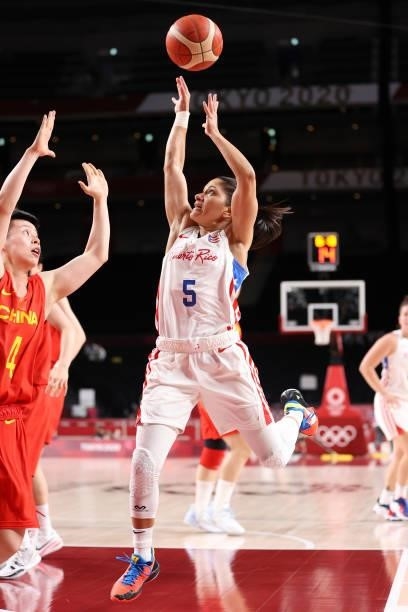 Pamela Rosado of Team Puerto Rico shoots over Yuan Li of Team China during the first half of a Women's Preliminary Round Group C game on day four of...