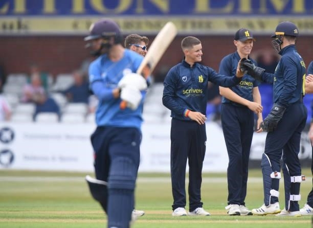 Jacob Bethell of Warwickshire celebrates bowling out Alex Hughes of Derbyshire during the Royal London Cup match between Derbyshire and Warwickshire...
