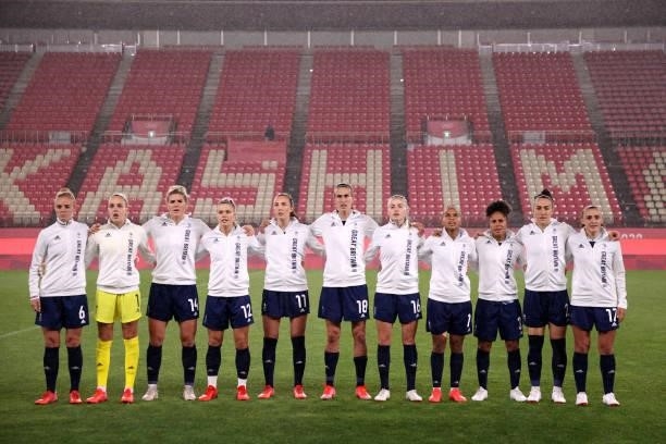Players of Team Great Britain stand for the national anthem prior to the Women's Group E match between Canada and Great Britain on day four of the...