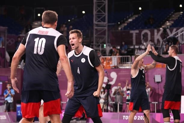 Alexander Zuev of Team ROC celebrates victory with Stanislav Sharov of Team ROC in the 3x3 Basketball competition on day four of the Tokyo 2020...