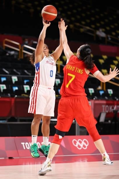 Jennifer O'Neill of Team Puerto Rico takes a jump shot over Ting Shao of Team China during the first half of a Women's Preliminary Round Group C game...