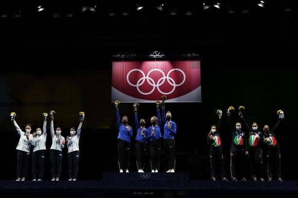 Silver medalists Team South Korea, gold medalists Team Estonia and bronze medalists Team Italy pose on the podium during the Women's Epée Team...