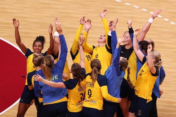 Team Sweden celebrate after winning the Woman's Preliminary Round Group B match between Sweden and ROC on day four of the Tokyo 2020 Olympic Games at...