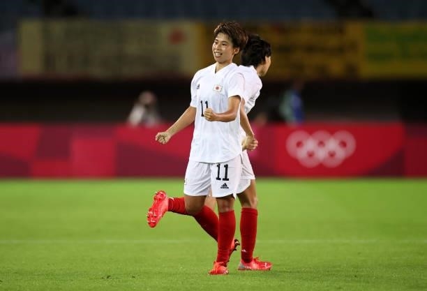 Mina Tanaka of Team Japan celebrates after scoring their side's first goal during the Women's Group E match between Chile and Japan on day four of...