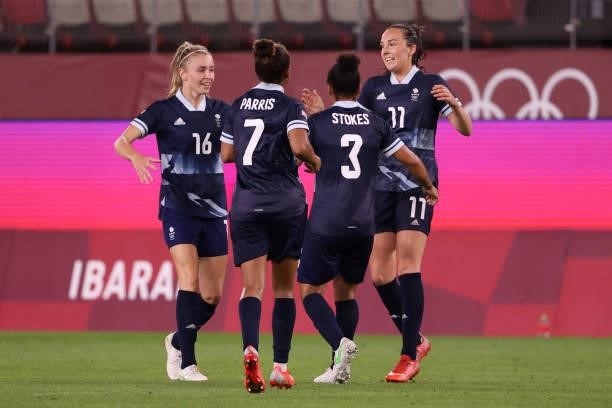 Caroline Weir of Team Great Britain celebrates with Leah Williamson and teammates after scoring their side's first goal during the Women's Group E...