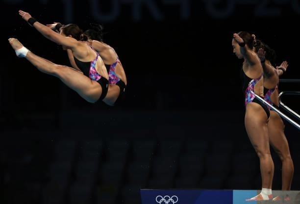 Mun Yee Leong and Pandelela Pamg of Team Malaysia compete during the Women's Synchronised 10m Platform Final on day four of the Tokyo 2020 Olympic...