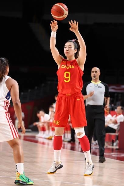 Meng Li of Team China passes the ball against Puerto Rico during the second half of a Women's Preliminary Round Group C game on day four of the Tokyo...