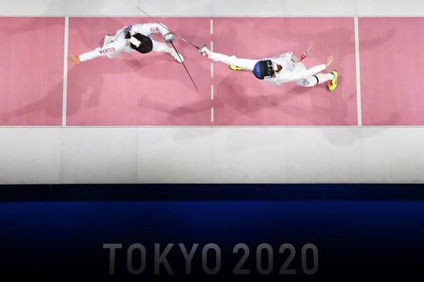 Young Mi Kang of Team South Korea Julia Beljajeva of Team Estonia during the Women's Epée Team Gold Medal Match on day four of the Tokyo 2020 Olympic...