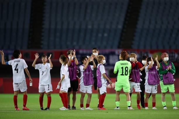 Players of Team Japan acknowledge the fans after the Women's Group E match between Chile and Japan on day four of the Tokyo 2020 Olympic Games at...