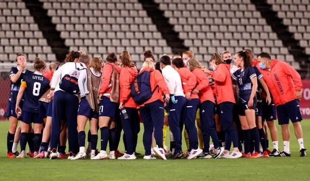 Players of Team Great Britain form a huddle following the Women's Group E match between Canada and Great Britain on day four of the Tokyo 2020...