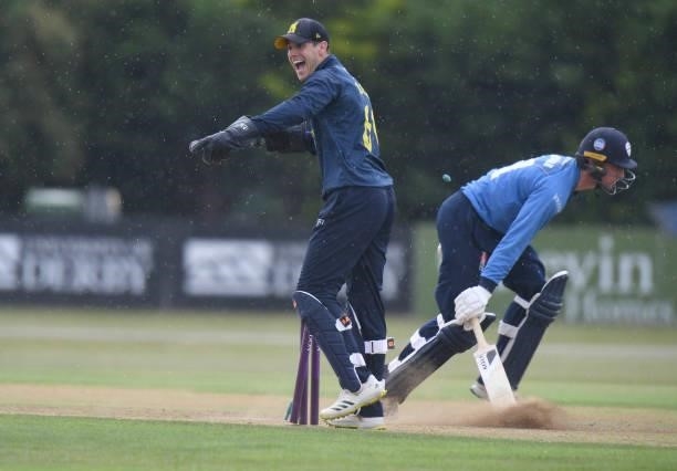 Mattie McKiernan of Derbyshire is run out by Michael Burgess of Warwickshire during the Royal London Cup match between Derbyshire and Warwickshire at...