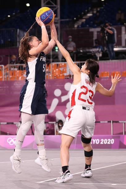 Marie-Eve Paget of Team France shoots against Mai Yamamoto of Team Japan in the 3x3 Basketball competition on day four of the Tokyo 2020 Olympic...