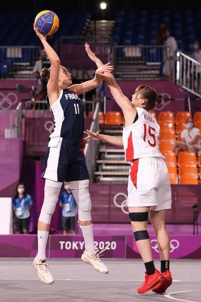 Ana Maria Filip of Team France shoots against Risa Nishioka of Team Japan in the 3x3 Basketball competition on day four of the Tokyo 2020 Olympic...