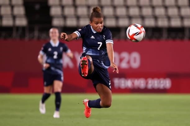 Nikita Parris of Team Great Britain jumps to control the ball during the Women's Group E match between Canada and Great Britain on day four of the...