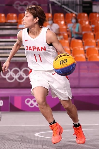 Mio Shinozaki of Team Japan handles the ball in the 3x3 Basketball competition on day four of the Tokyo 2020 Olympic Games at Aomi Urban Sports Park...