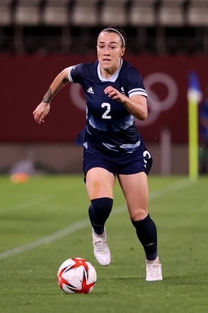 Lucy Bronze of Team Great Britain runs with the ball during the Women's Group E match between Canada and Great Britain on day four of the Tokyo 2020...