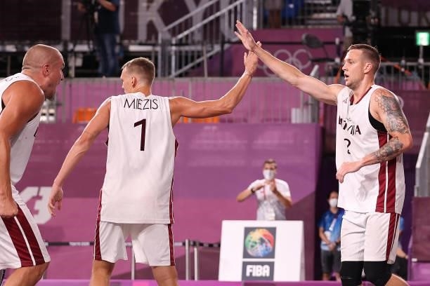 Karlis Lasmanis of Team Latvia reacts with Nauris Miezis of Team Latvia and lamin the 3x3 Basketball competition on day four of the Tokyo 2020...