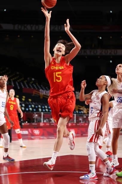 Xu Han of Team China drives to the basket against Puerto Rico during the second half of a Women's Preliminary Round Group C game on day four of the...