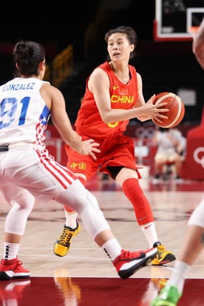 Siyu Wang of Team China looks to pass against Puerto Rico during the second half of a Women's Preliminary Round Group C game on day four of the Tokyo...