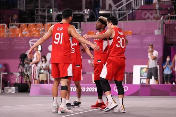 Team Japan react after their loss in the 3x3 Basketball competition on day four of the Tokyo 2020 Olympic Games at Aomi Urban Sports Park on July 27,...