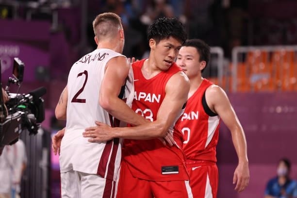 Karlis Lasmanis of Team Latvia and Ryuto Yasuoka of Team Japan after the match in the 3x3 Basketball competition on day four of the Tokyo 2020...
