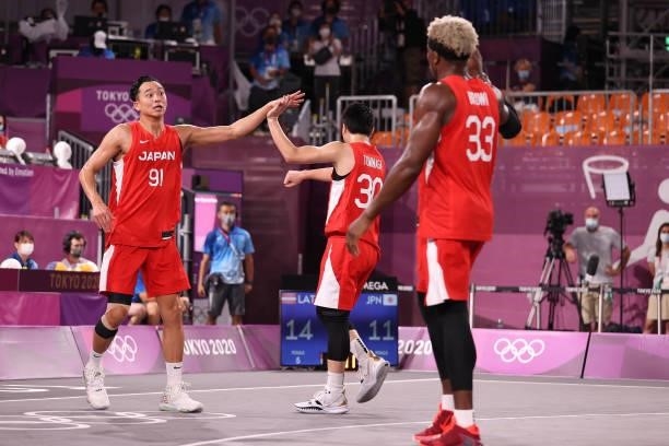 Tomoya Ochiai of Team Japan celebrates in the 3x3 Basketball competition on day four of the Tokyo 2020 Olympic Games at Aomi Urban Sports Park on...