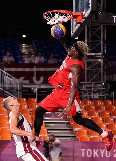 Ira Brown of Team Japan slam dunks the ball in the 3x3 Basketball competition on day four of the Tokyo 2020 Olympic Games at Aomi Urban Sports Park...