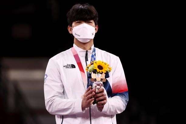 Bronze medalist In Kyo-don of Team South Korea poses with the bronze medal for the Men's +80kg Taekwondo on day four of the Tokyo 2020 Olympic Games...