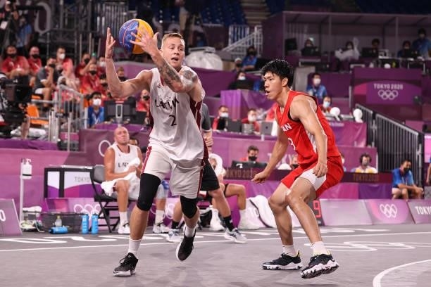 Karlis Lasmanis of Team Latvia catches the ball in the 3x3 Basketball competition on day four of the Tokyo 2020 Olympic Games at Aomi Urban Sports...