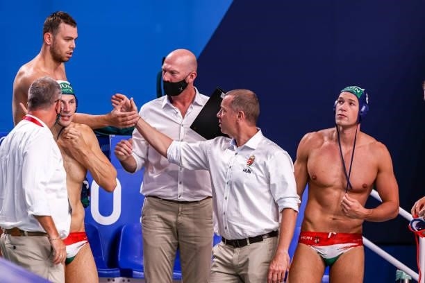 Balasz Erdelyi of Hungary, head coach Tamas Marcz of Hungary during the Tokyo 2020 Olympic Waterpolo Tournament men match between Japan and Hungary...