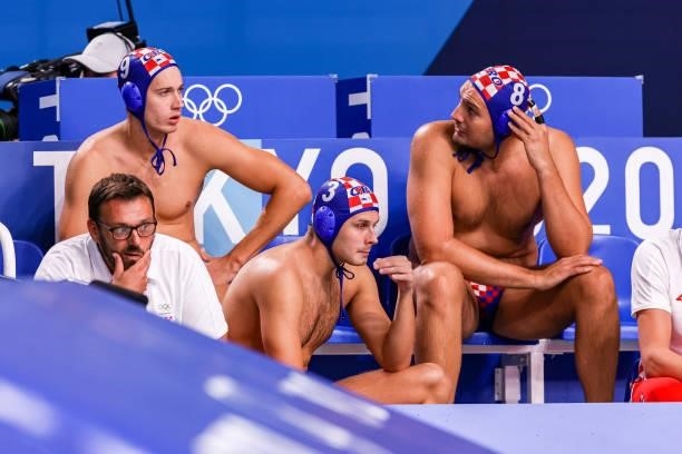 Lovre Milos of Croatia, Loren Fatovic of Croatia, Andro Buslje of Croatia during the Tokyo 2020 Olympic Waterpolo Tournament men match between...