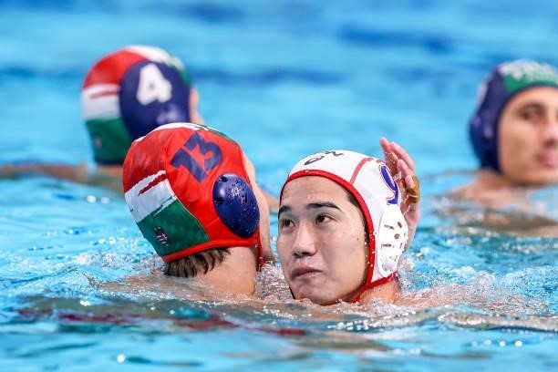 Soma Vogel of Hungary, Atsushi Arai of Japan during the Tokyo 2020 Olympic Waterpolo Tournament men match between Japan and Hungary at Tatsumi...