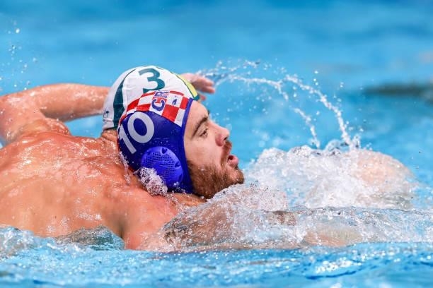 George Ford of Australia, Josip Vrlic of Croatia during the Tokyo 2020 Olympic Waterpolo Tournament men match between Australia and Croatia at...