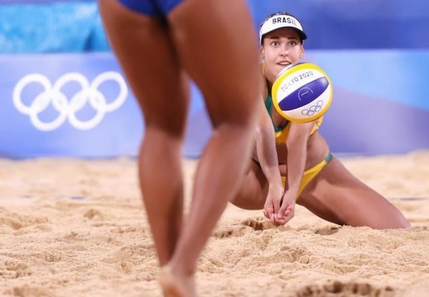 Eduarda Santos Lisboa of Team Brazil competes against Team China during the Women's Preliminary - Pool C beach volleyball on day four of the Tokyo...