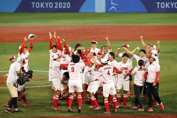 Team Japan celebrates after defeating Team United States 2-0 in the Softball Gold Medal Game between Team Japan and Team United States on day four of...
