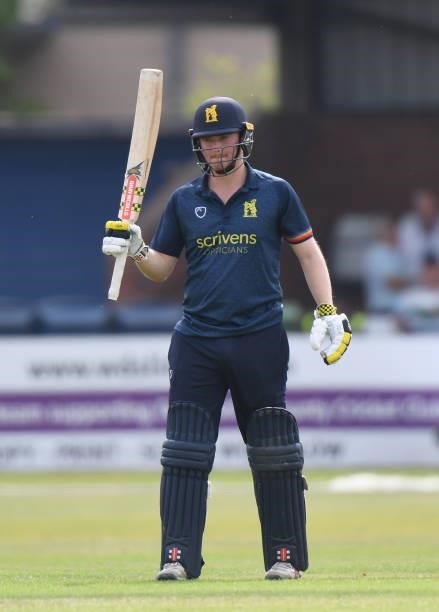 Ed Pollock of Warwickshire celebrates reaching his 50 during the Royal London Cup match between Derbyshire and Warwickshire at The Incora County...