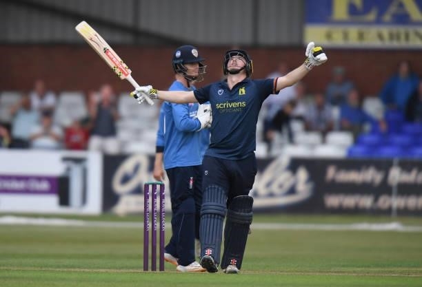 Ed Pollock of Warwickshire celebrates reaching his 100 during the Royal London Cup match between Derbyshire and Warwickshire at The Incora County...