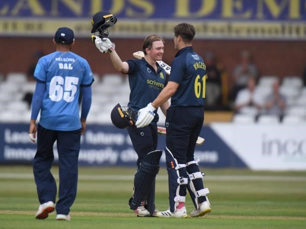 Ed Pollock and Michael Burgess of Warwickshire celebrates winning the match during the Royal London Cup match between Derbyshire and Warwickshire at...