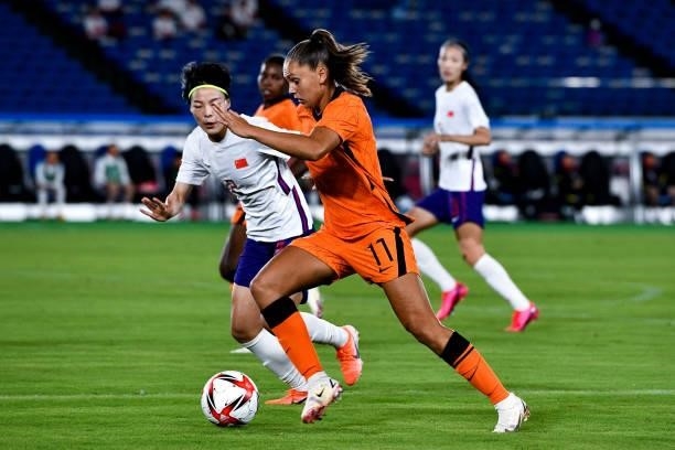 Mengwen Li of China and Lieke Martens of the Netherlands during the Tokyo 2020 Olympic Womens Football Tournament match between Netherlands and China...